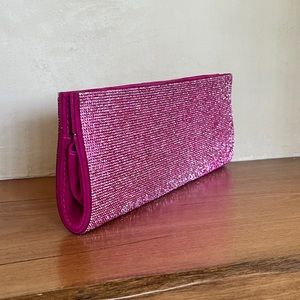 Pink bedazzled clutch